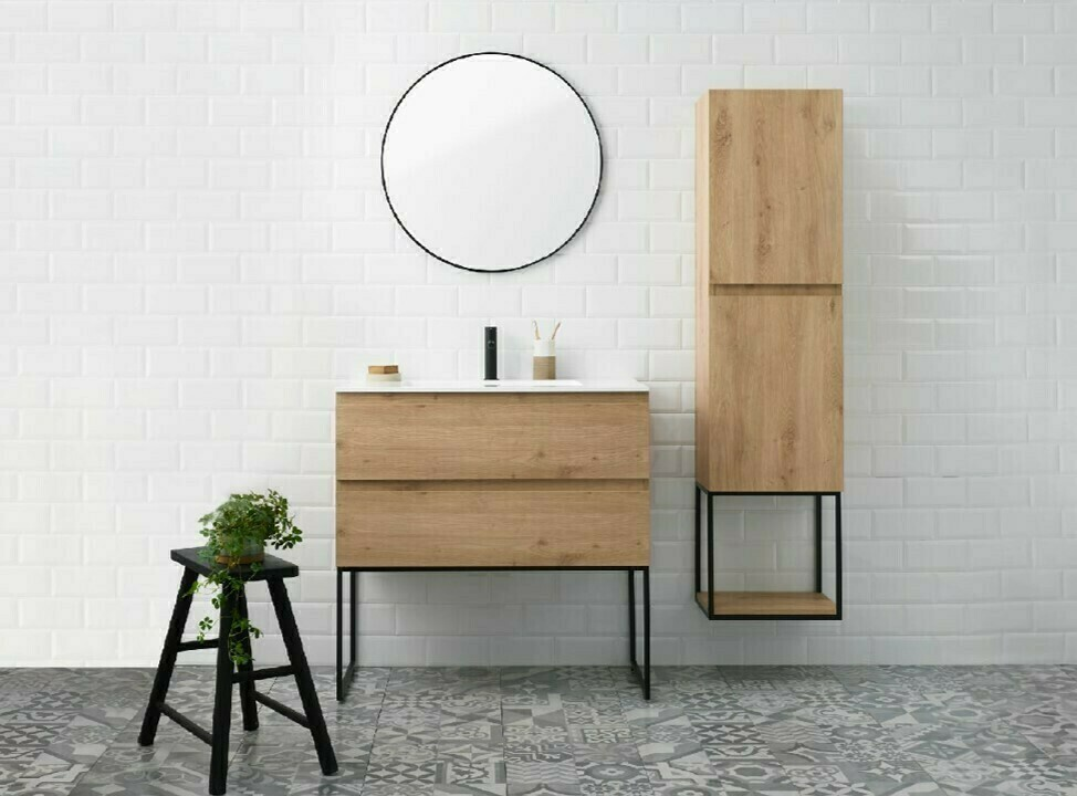 Een houten badkamermeubel met een ronde spiegel erboven | Un meuble de salle de bain en bois avec un miroir rond au-dessus
