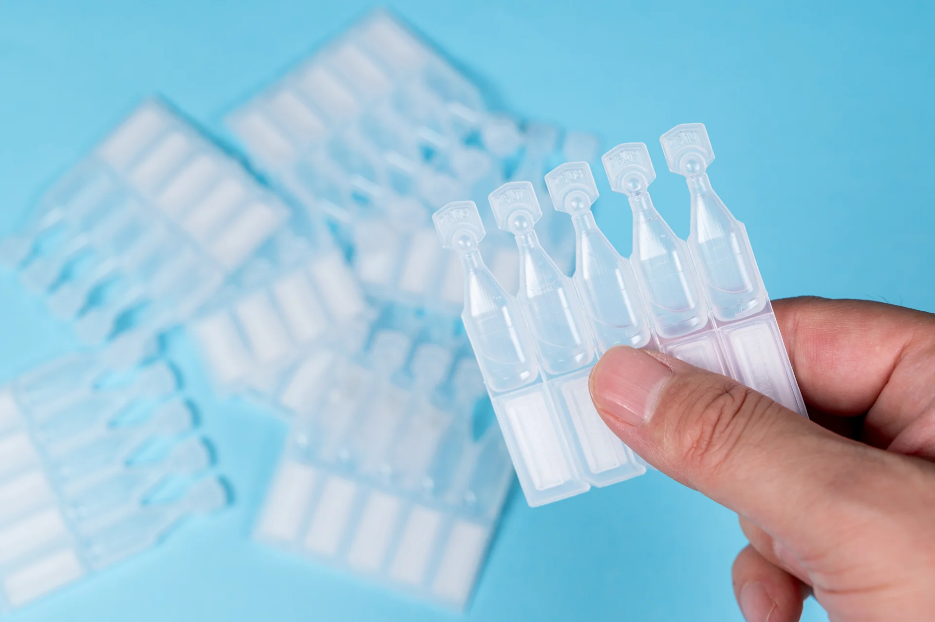 Stock image of disposable eye drops Stock image of disposable eye drops