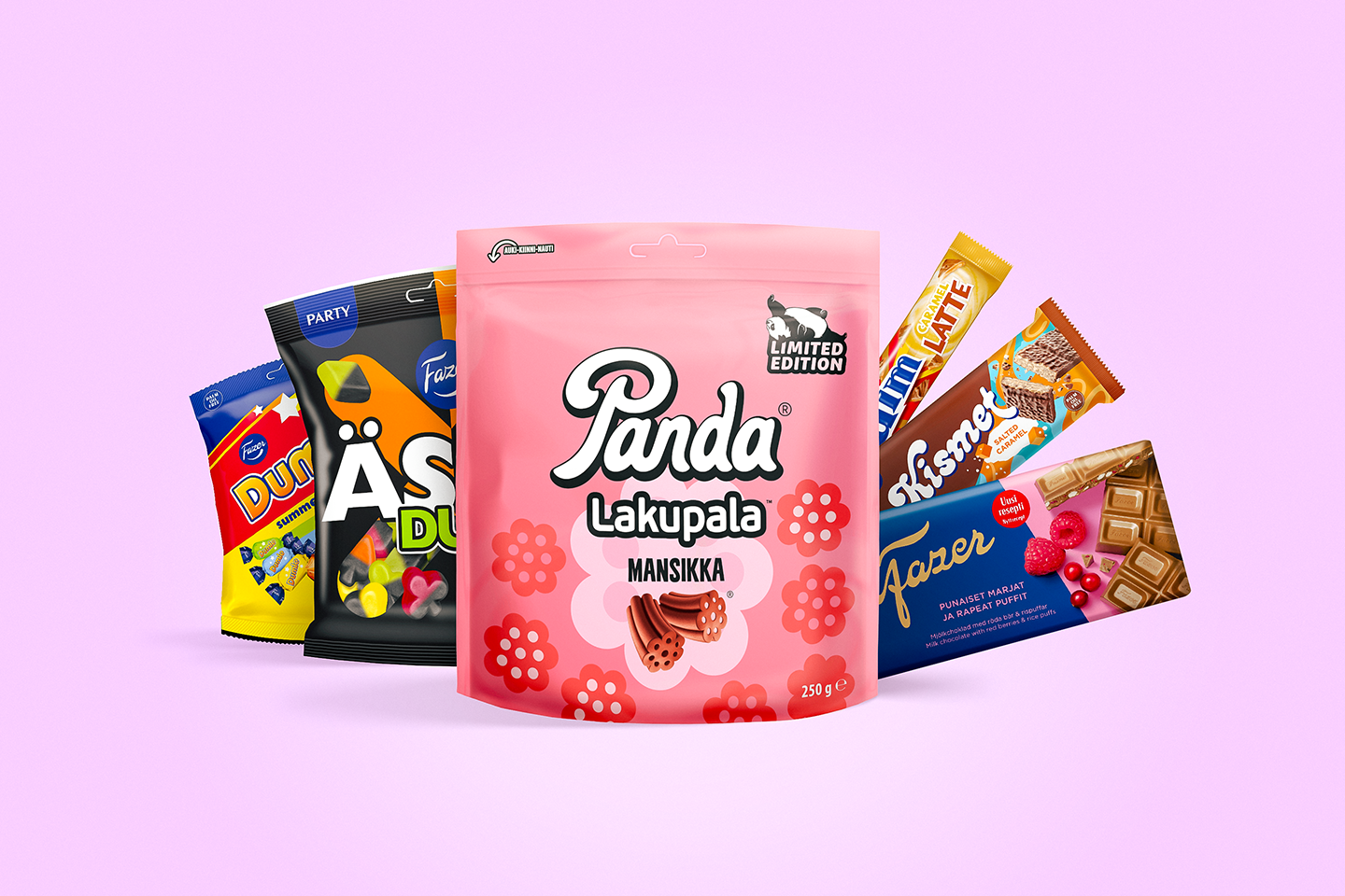 Tuotekollaasi karkkipusseja ja suklaalevyjä pinkillä pohjalla. Panda Lakupala Mansikka, Fazer Ässä Duo, Dumle Summer Mix, Fazer Punaiset marjat ja rapeat puffit, Kismet Salted Caramel, Daim Caramel Latte