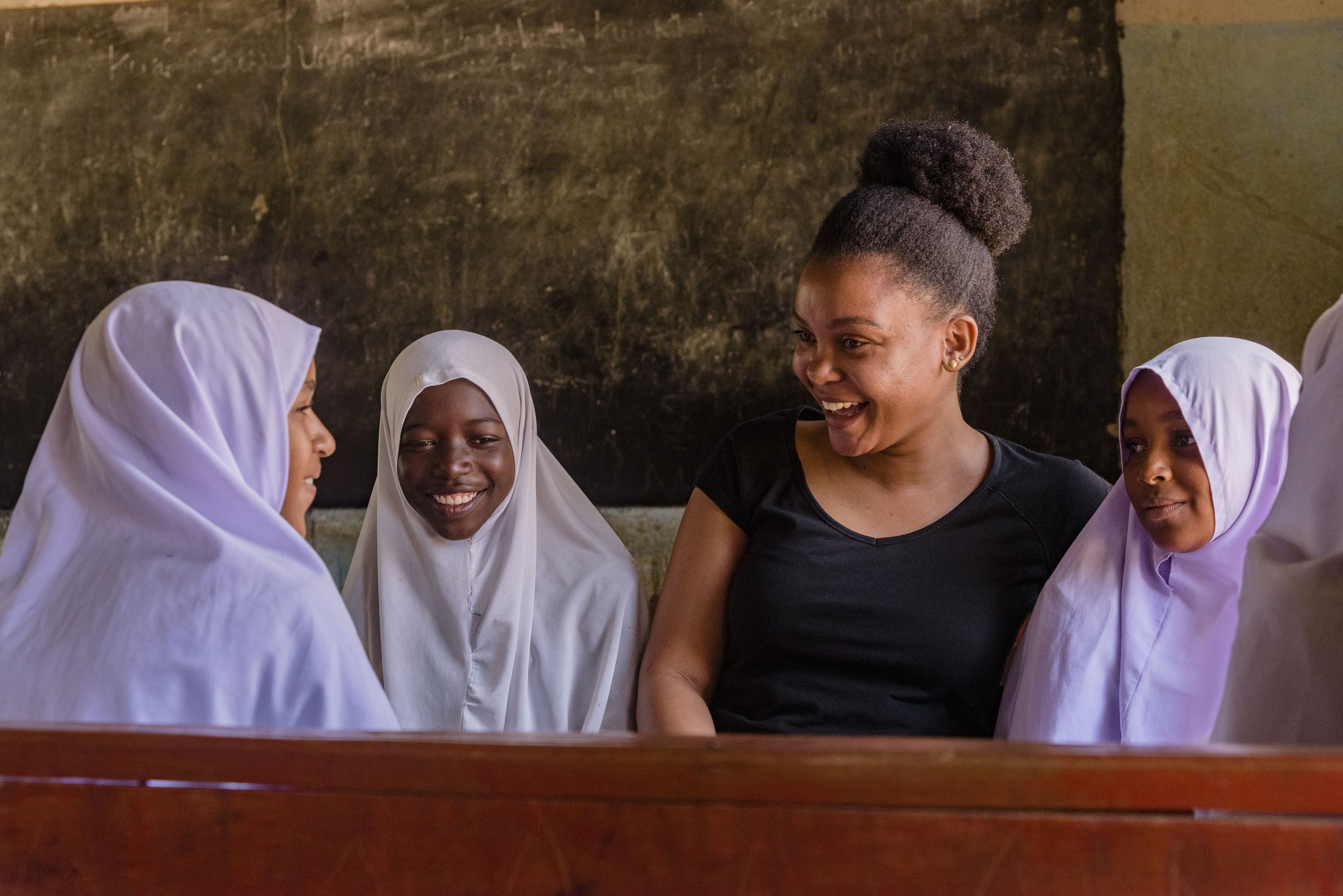 Tanzania grantee with girls 