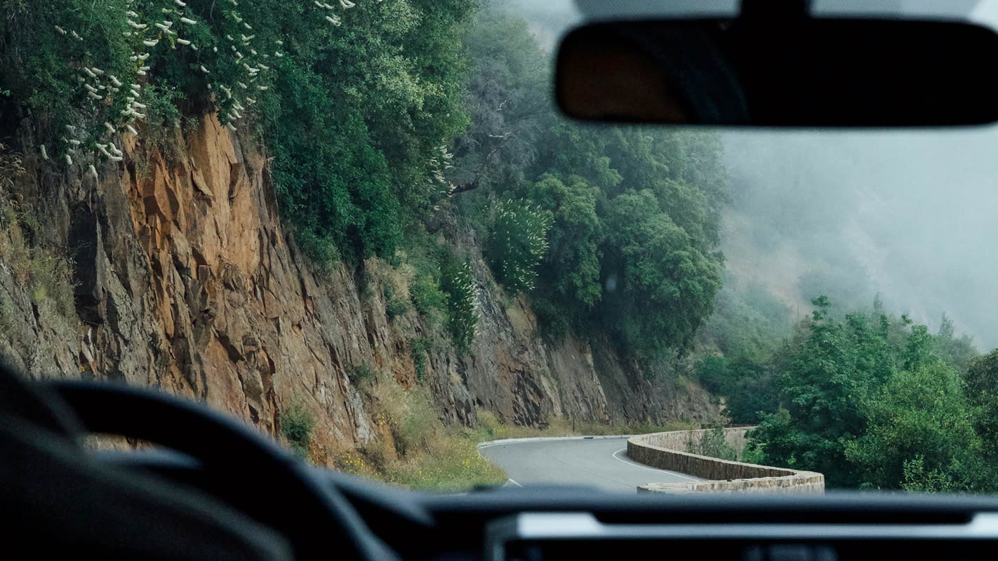 Hero-for-partner-dark-silhouette-windscreen-road-bushes