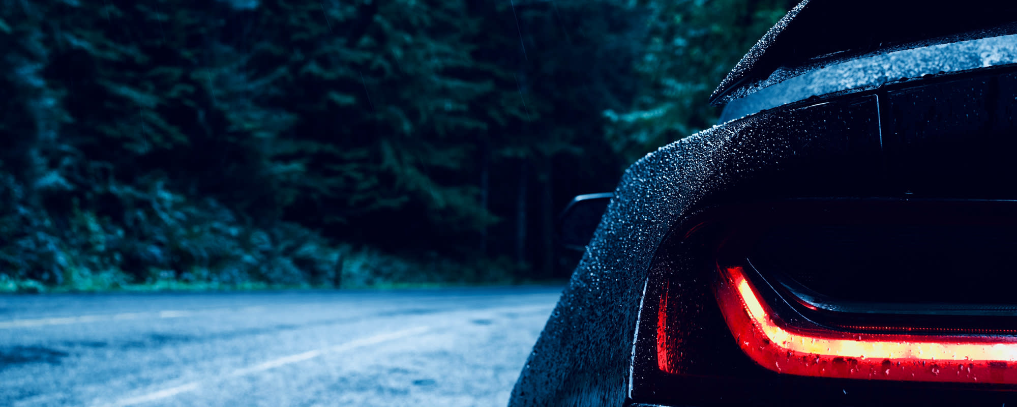 Hero-for-partner-LESS-close-up-rear-car-dark-rain2