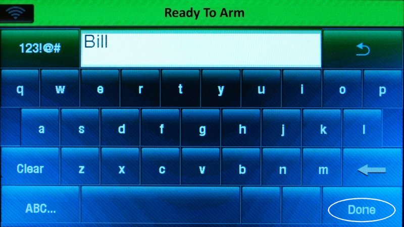 The Lynx Touch panel User screen with a QWERTY keyboard displayed, Bill entered as a name, and the Done circled