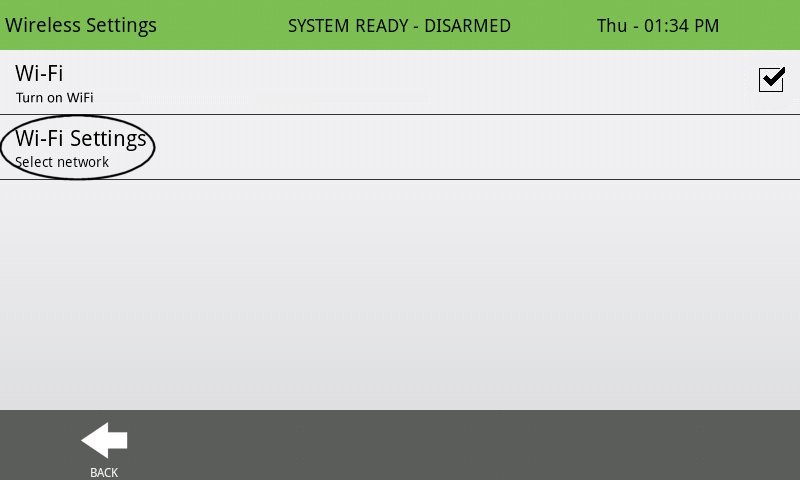 A picture of the IQ panel wireless settings screen with a circle around the select network button