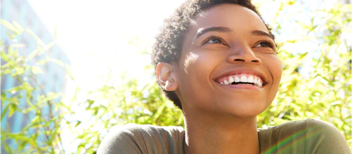 Person smiling outdoors