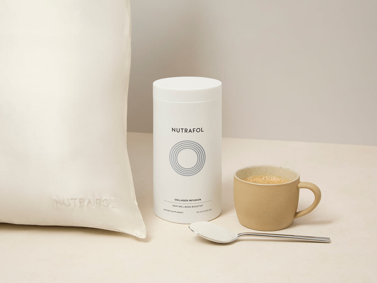 Nutrafol promotional gifts: waffle towel, wet brush, and silk scrunchie