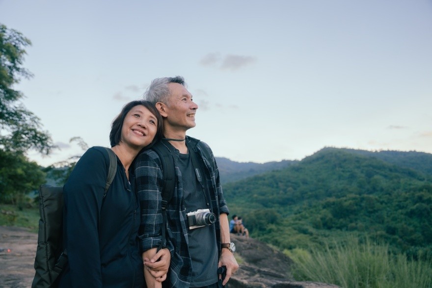couple hiking in mountains 