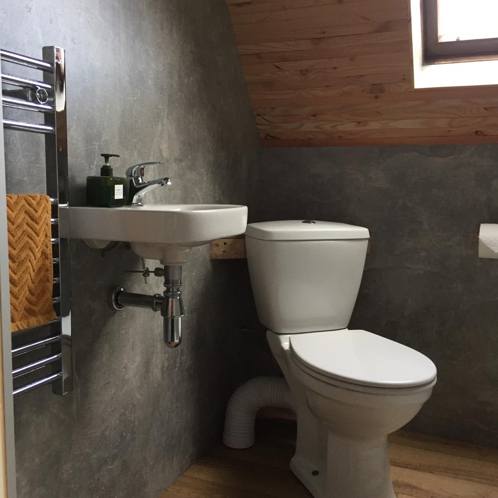 Bathroom with heated towel rail