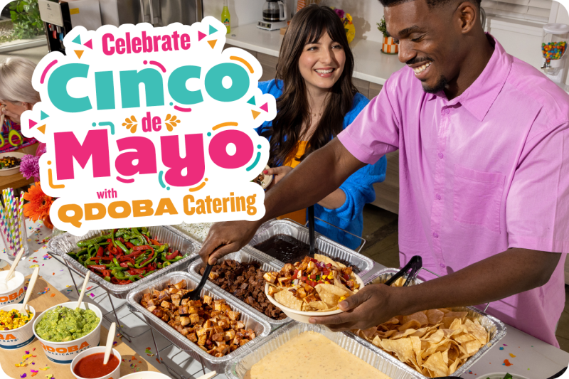 People celebrate the Cinco de Mayo holiday with Qdoba Mexican Eats' Catering Hot Bar spread. 