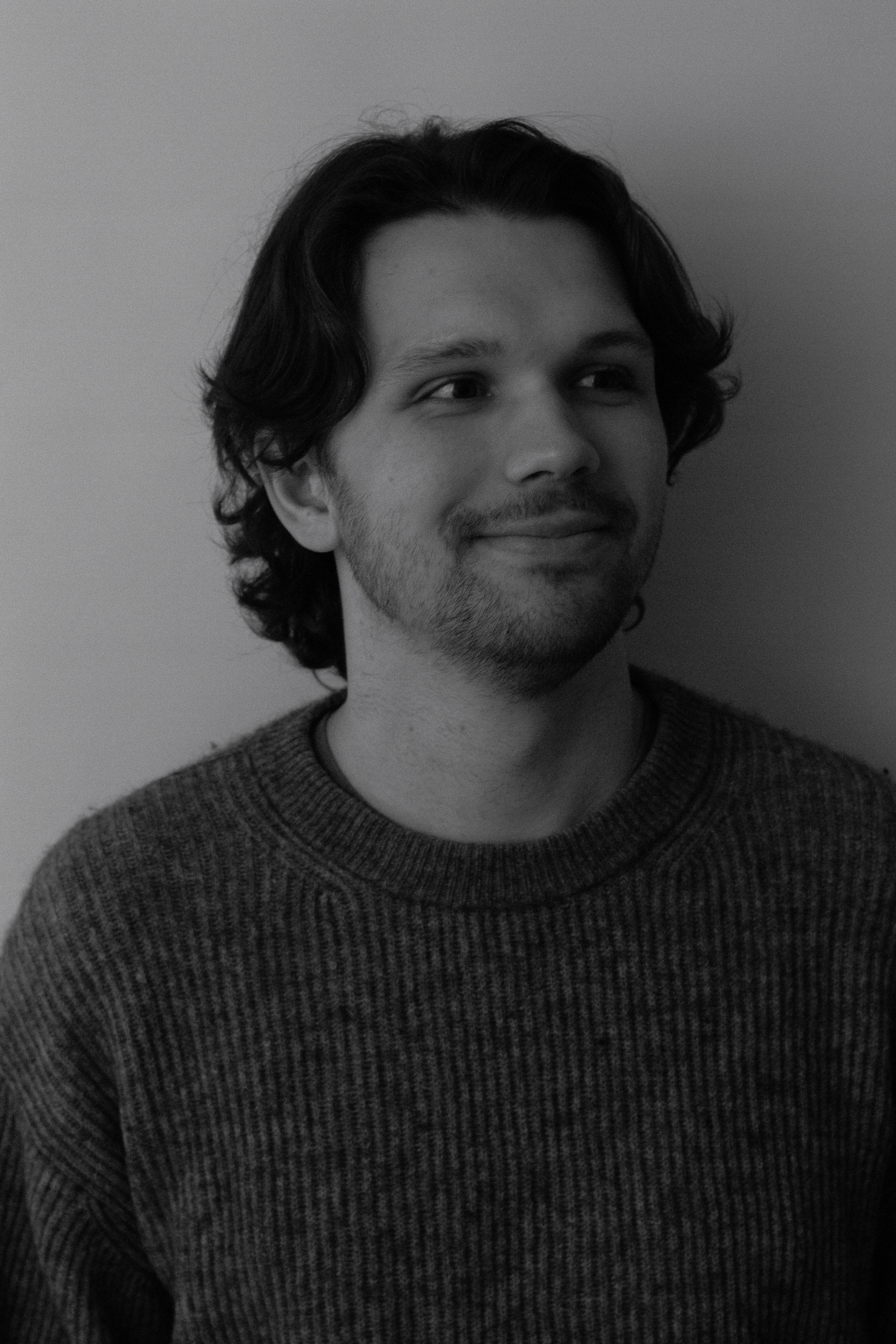 Headshot image of Liam