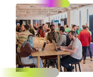 Replay attendees sitting at a table graphic