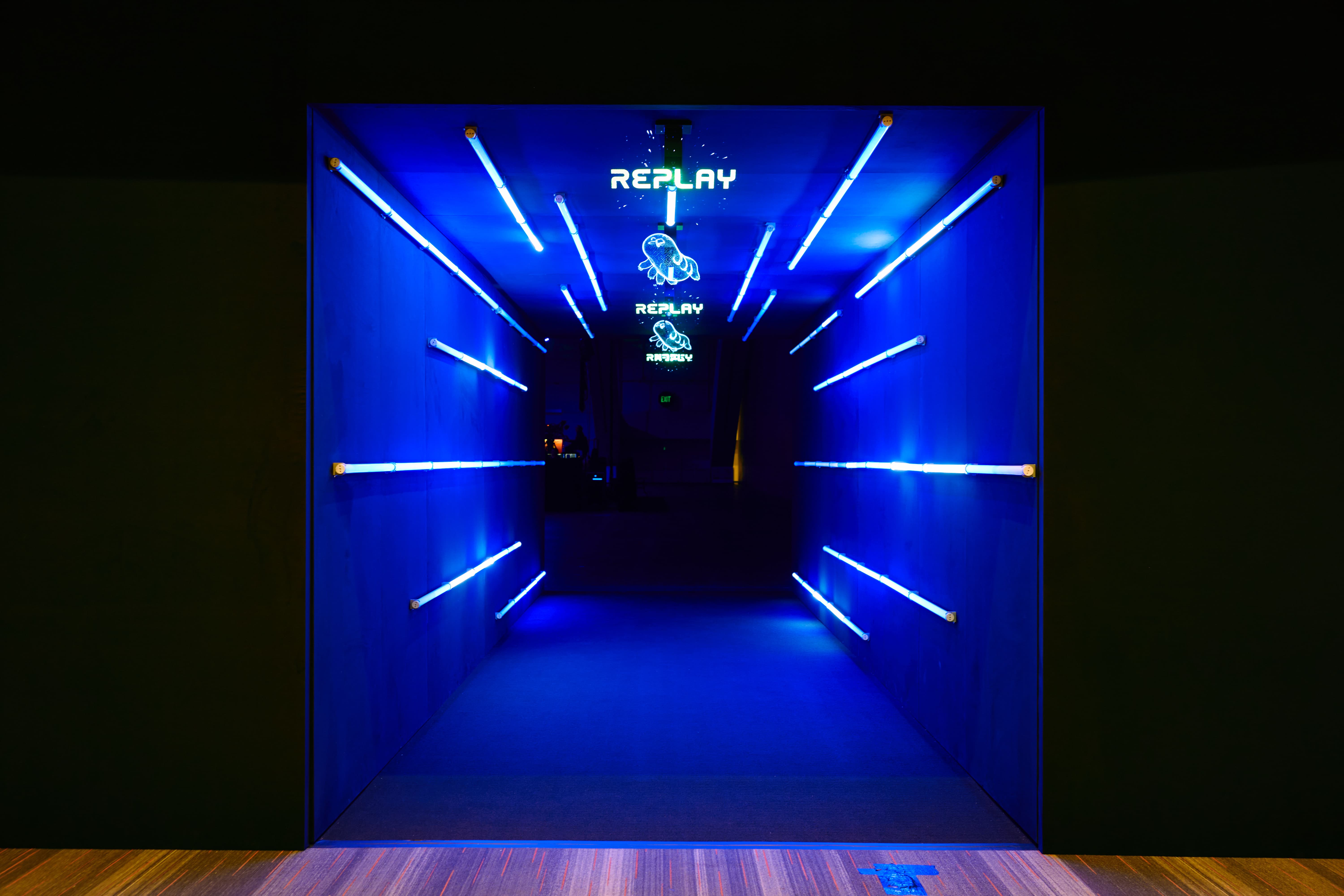 Replay 2026 hallway to keynote presentation