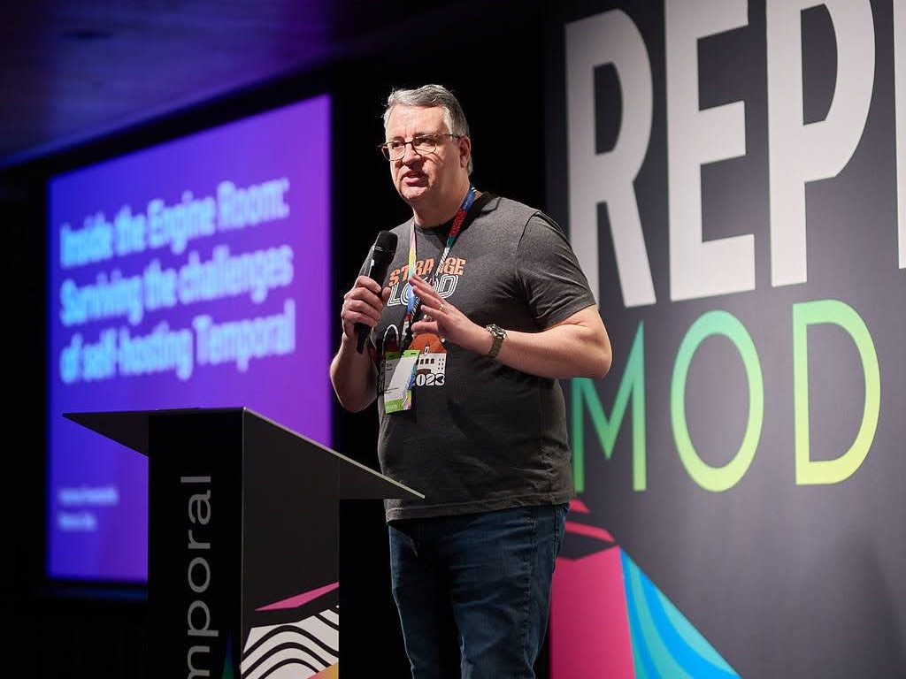 Tom Wheeler speaking at Replay 2025