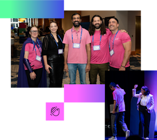 Five conference attendees wearing pink shirts and blue lanyards pose together in a hotel lobby, with colorful graphics.
