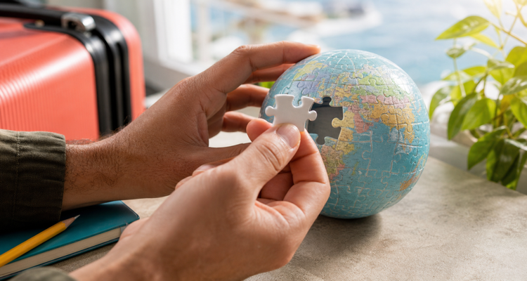 travel-cancellation-insurance-globe-puzzle-750x400