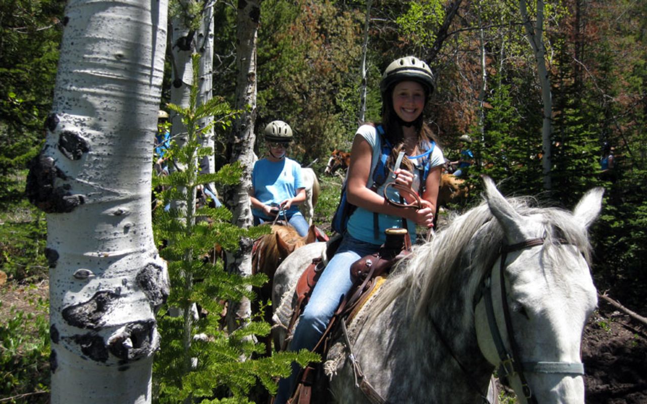 Fall/Winter Family Itinerary: 6 Days Logan to Jackson to Yellowstone | Photo Gallery | 4 - Horseback riding in Logan Canyon at  Beaver Creek Lodge