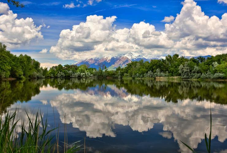 Ogden | Photo Gallery | 0 - Mountains reflecting on a pond in northern Utah