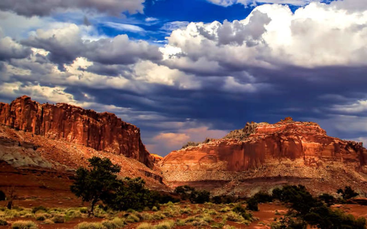 Capitol Reef Visitor Center | Photo Gallery | 0 - Red rock mountains in the desert near Capitol Reef