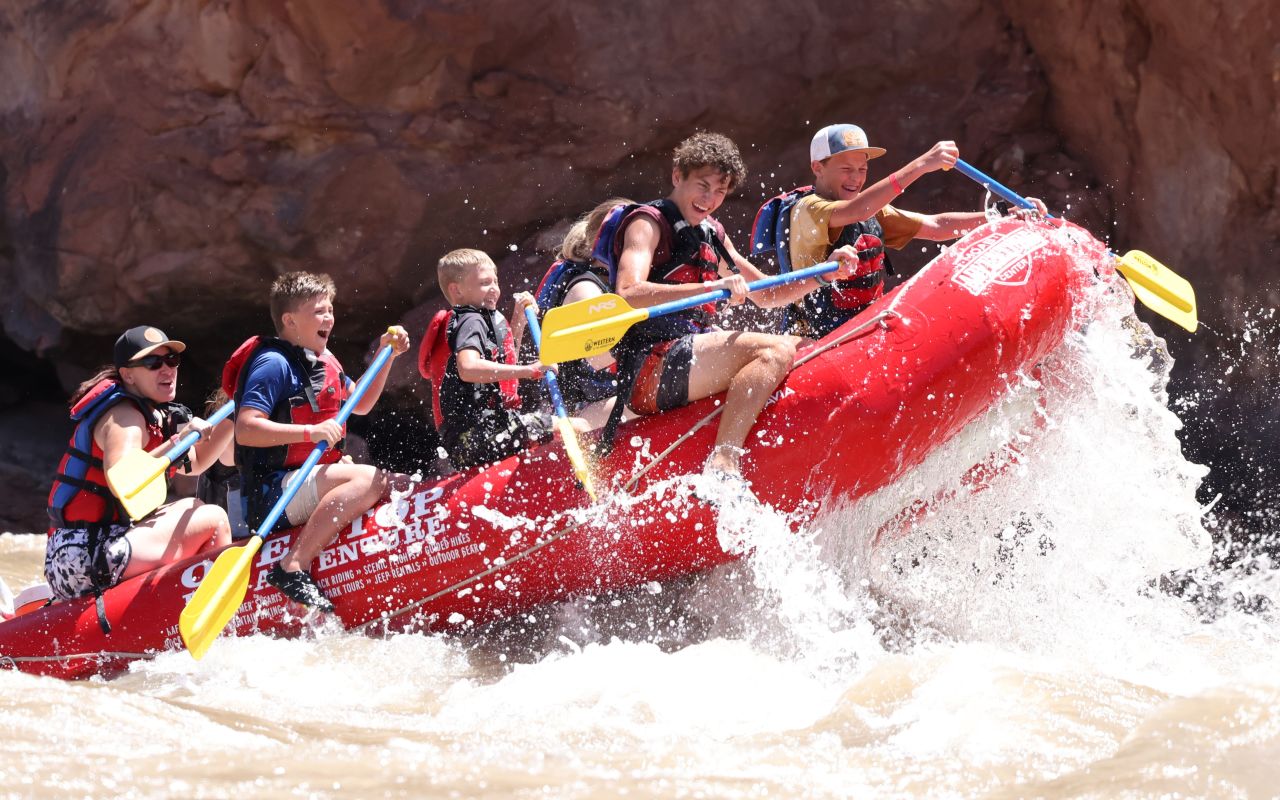 Moab Adventure Center | Photo Gallery | 6 - River Rafting Tours Experience the "Best Guided Moab Rafting Trips" in Moab, Utah. This is a "must-do adventure" while in Moab. On our full-day and half-day river rafting adventures, you'll experience a world-renowned stretch of the Colorado River, winding through scenes made famous by dozens of popular movies.