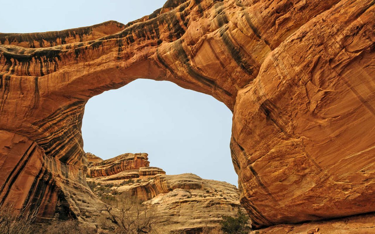 Natural Bridges | Photo Gallery | 1 -  Three massive arches in a tiny 10-mile loop. Bring your hiking shoes and your camera and spend some time thinking up bridge metaphors that will solve our current divisive politics.