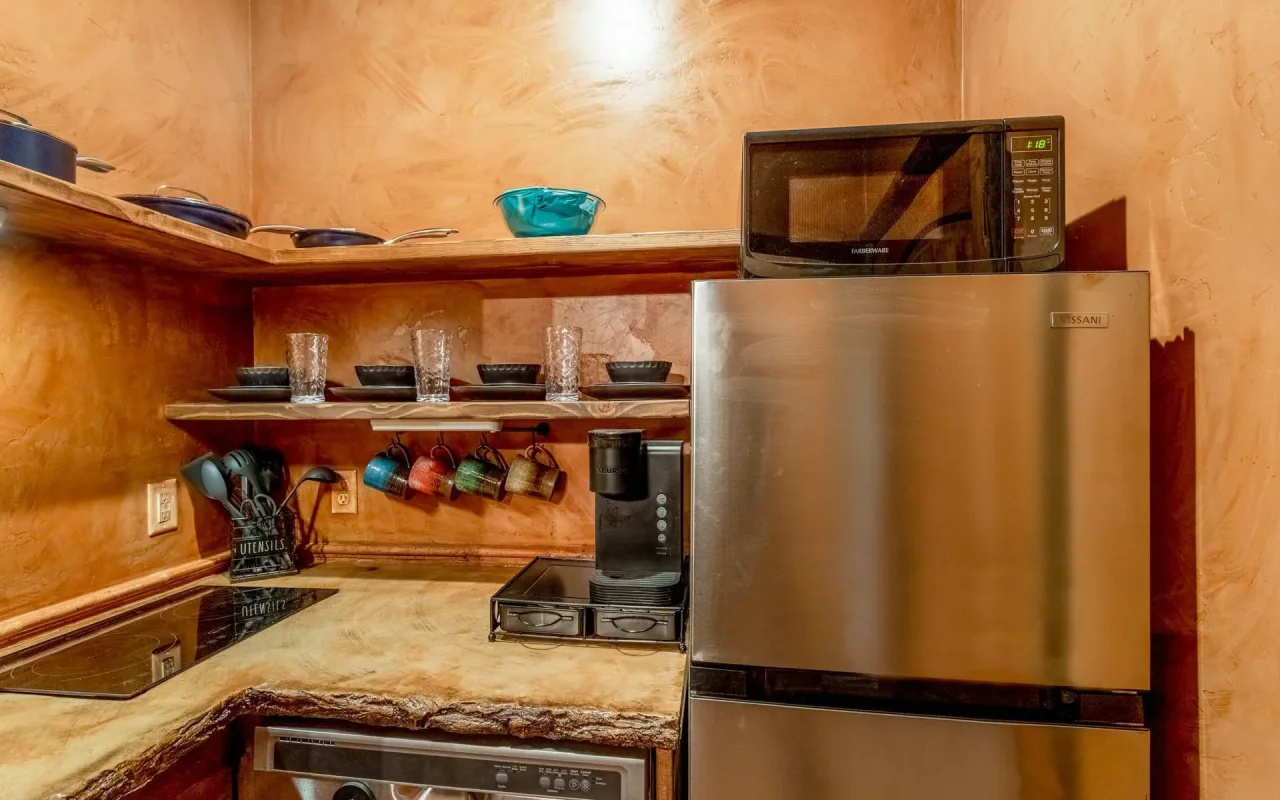 The luxury cliff dwellings each have a  kitchenette complete with cookware, microwave, refrigerator, and a two burner cook top. 