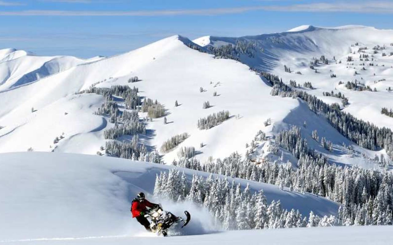 Park City Peaks Snowmobile Tours | Photo Gallery | 2 - Park City Peaks Snowmobile Tours Park City Peaks Snowmobile Tours takes you to the highest peaks (11,000), the largest bowls, and breathtaking mountaintop views. Just minutes from Park City, Utah.