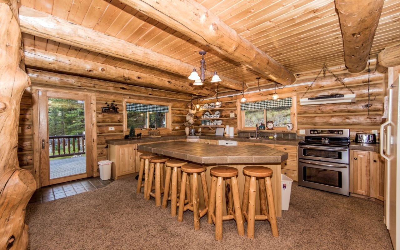 Bear Lake Premier Cabins | Photo Gallery | 5 - Kitchens are stocked with dishes and cooking utensils. 