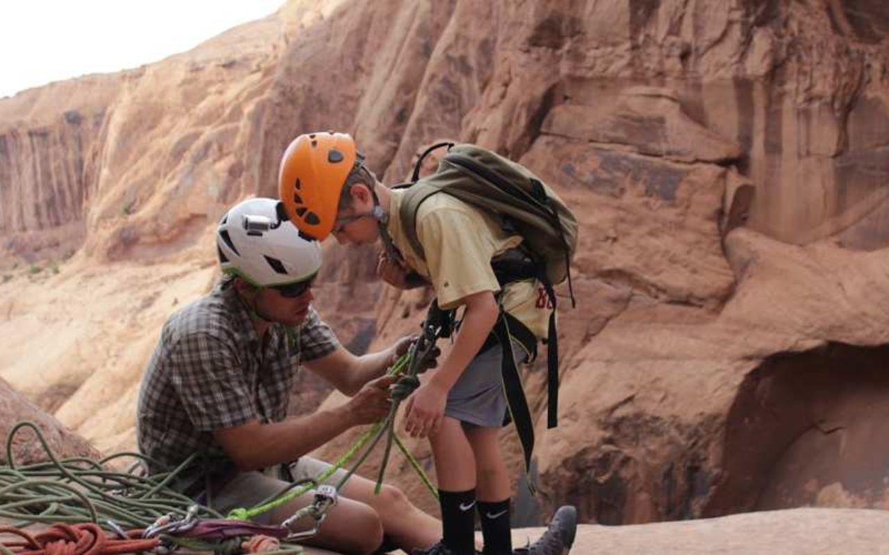 Moab Cliffs and Canyons | Photo Gallery | 18 - Kid Friendly Adventures Kid Climbing