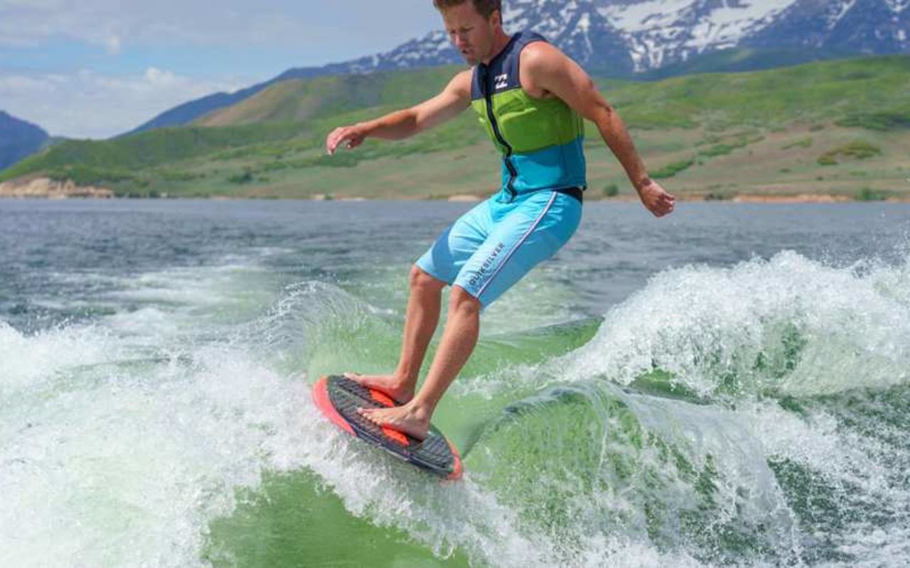 Deer Creek Island Resort | Photo Gallery | 7 - Wake Surfing Rent tubes, water skis, wakeboards, surf boards or any of our other accessories to make your time out on the water that much more memorable.