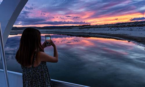 Enjoy a beautiful Lake Powell sunset from your houseboat. 