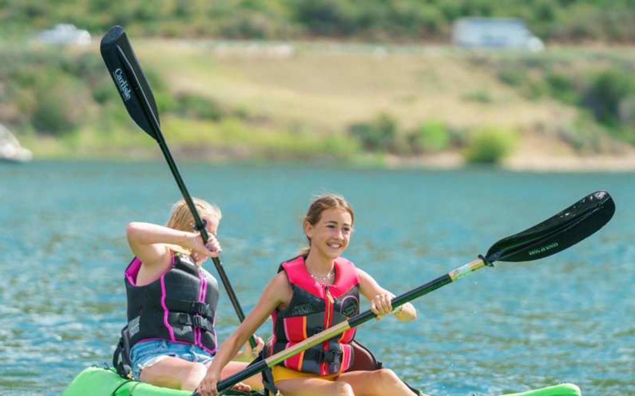 Deer Creek Island Resort | Photo Gallery | 9 - Kayak Rentals Get out on the lake with a single or tandem kayak, enjoy a relaxing time rowing or fishing in one of our canoes or be adventurous with a stand-up paddle board. No matter what you choose you'll never want to go back to shore.
