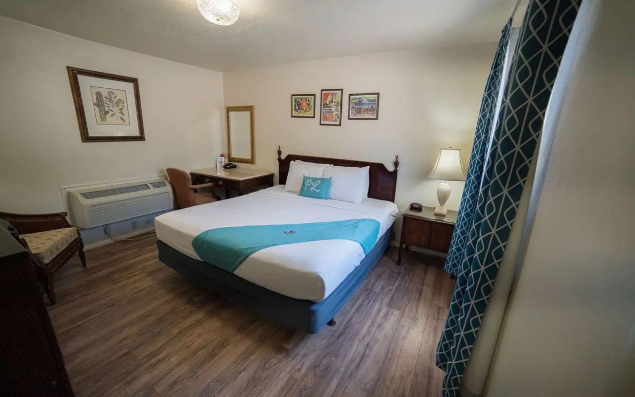 Parry Lodge | Photo Gallery | 2 - Hideout rooms offer one king bed, a flat screen TV, a refrigerator, microwave, coffee maker, hair dryer, iron & ironing board and free WiFi. 