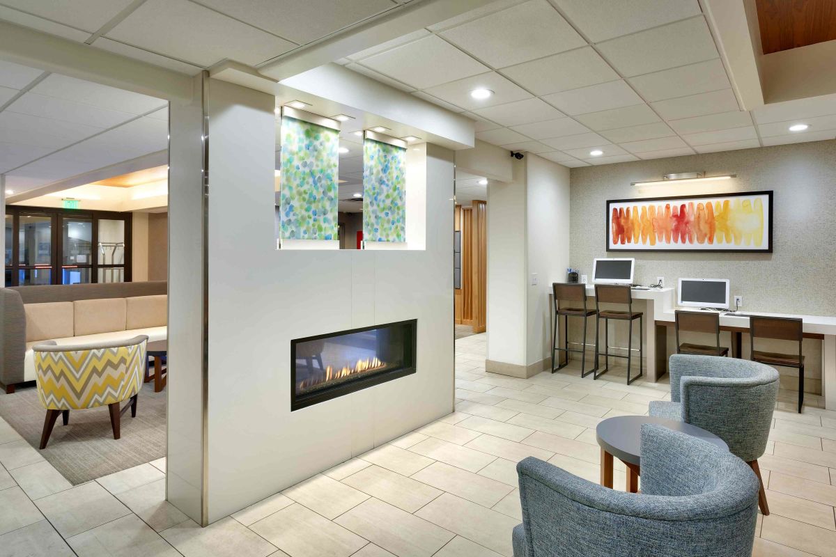 Holiday Inn Express & Suites - American Fork | Photo Gallery | 1 - Sit back and relax by the fireplace. 