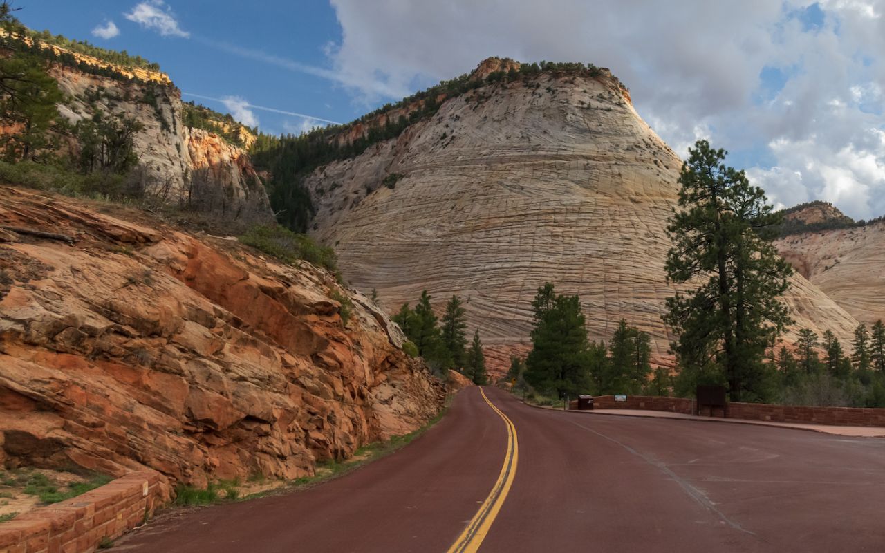 Checkerboard Mesa | Photo Gallery | 0 -  Checkerboard Mesa is an iconic and unique rock formation in Zion National Park.