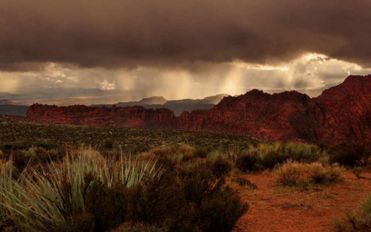 Snow Canyon | Photo Gallery | 1 - Rain clouds dropping rain over Snow Canyon State Park
