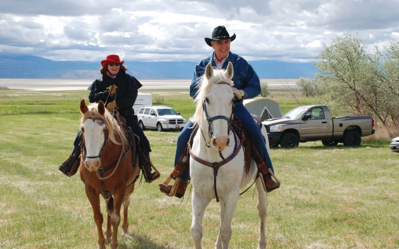Davis County | Photo Gallery | 5 - Couple riding on horseback in Utah