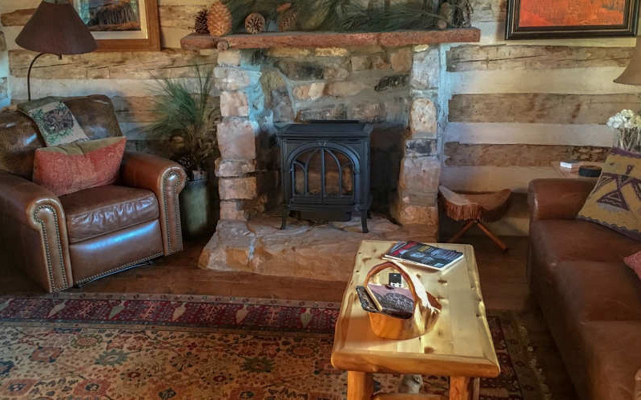 Cabins at Cottonwood Meadow Lodge | Photo Gallery | 8 - The Log Cabin - Sleeps 4 The Log Cabin is an ideal honeymoon or anniversary getaway with an intimate loft bedroom overlooking a quaint living room and gas log fireplace.