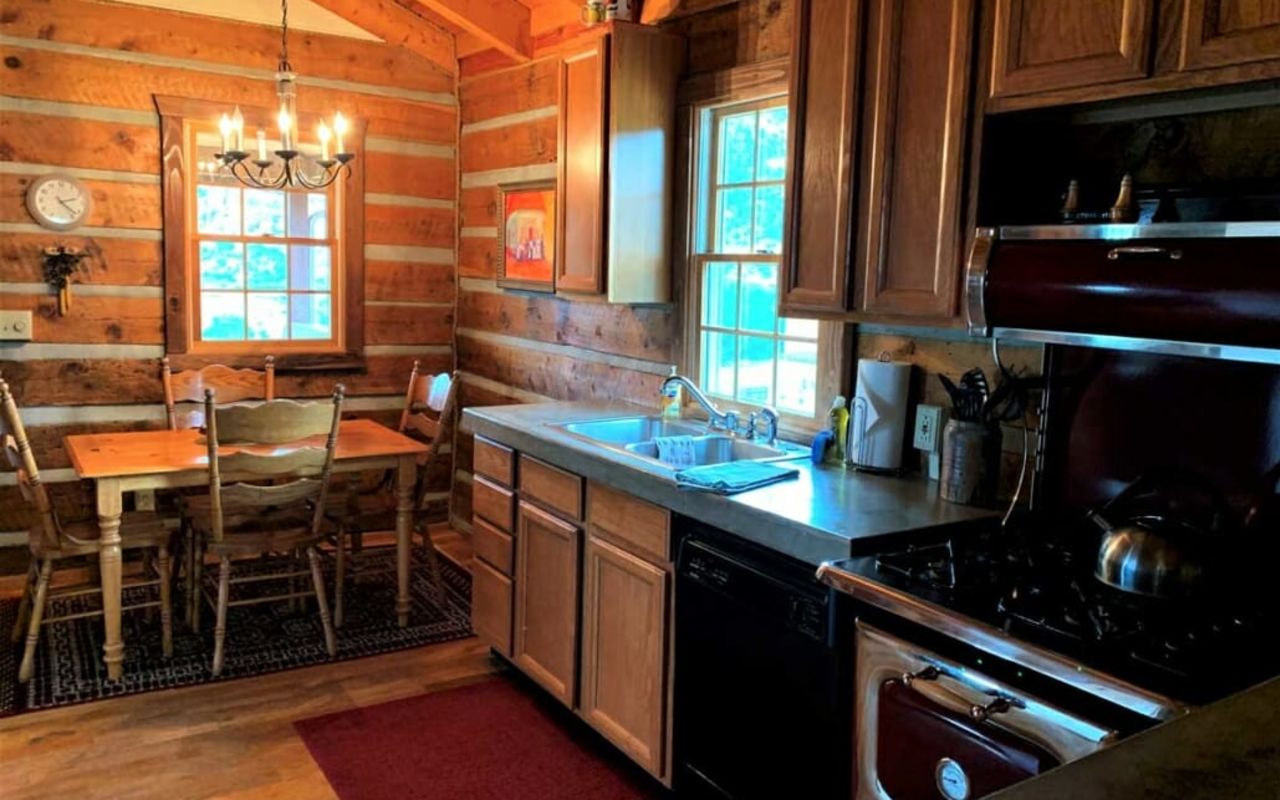Book a stay in the Isaac Riddle Cabin.  The cabin still caries the ambience of the original log construction but has the many modern necessities needed to make your stay very relaxing and enjoyable.