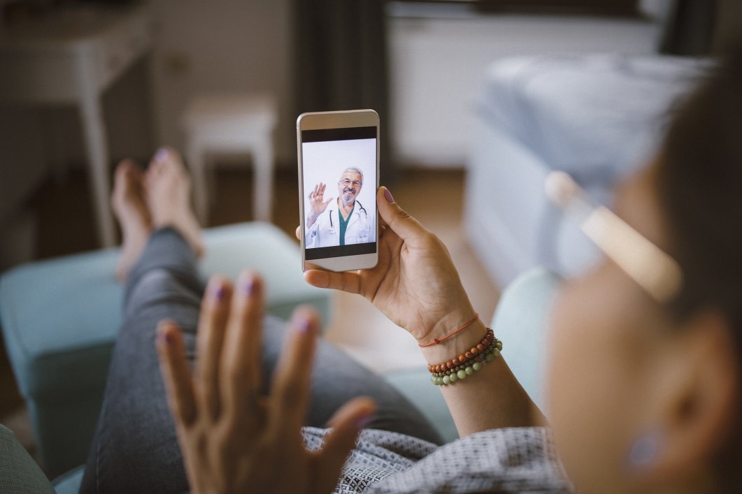 A patient having a virtual therapy session at home