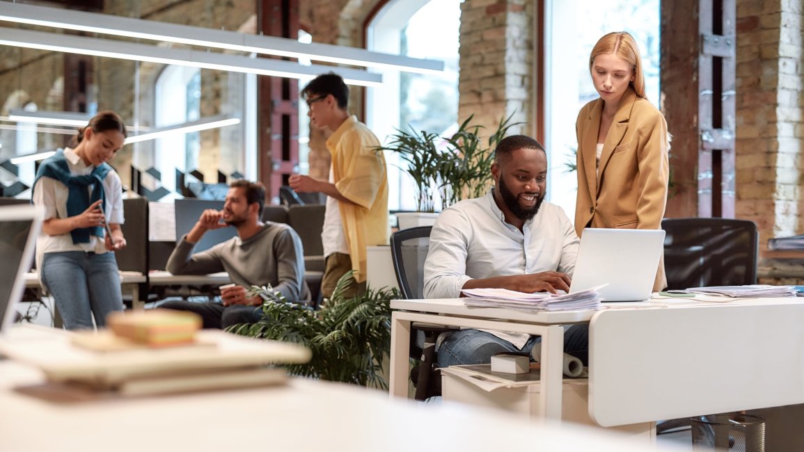 A group of colleague working together in a modern office