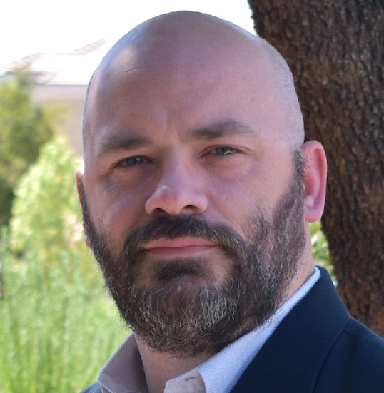 Headshot of William Barnett
