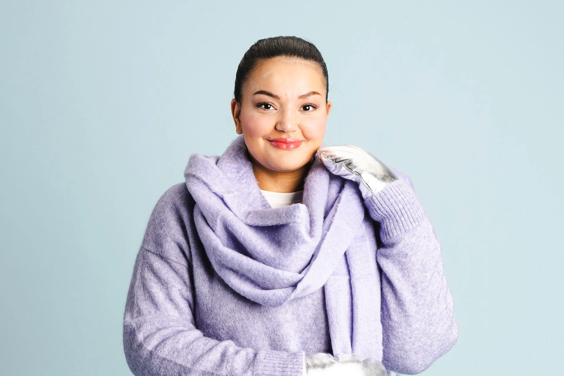 Naismalli talvisissa vaatteissa