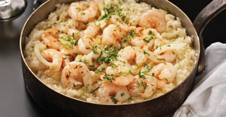 Crevettes au pastis et risotto au fenouil