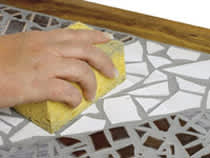 Ylimääräisen saumausaineen poistaminen