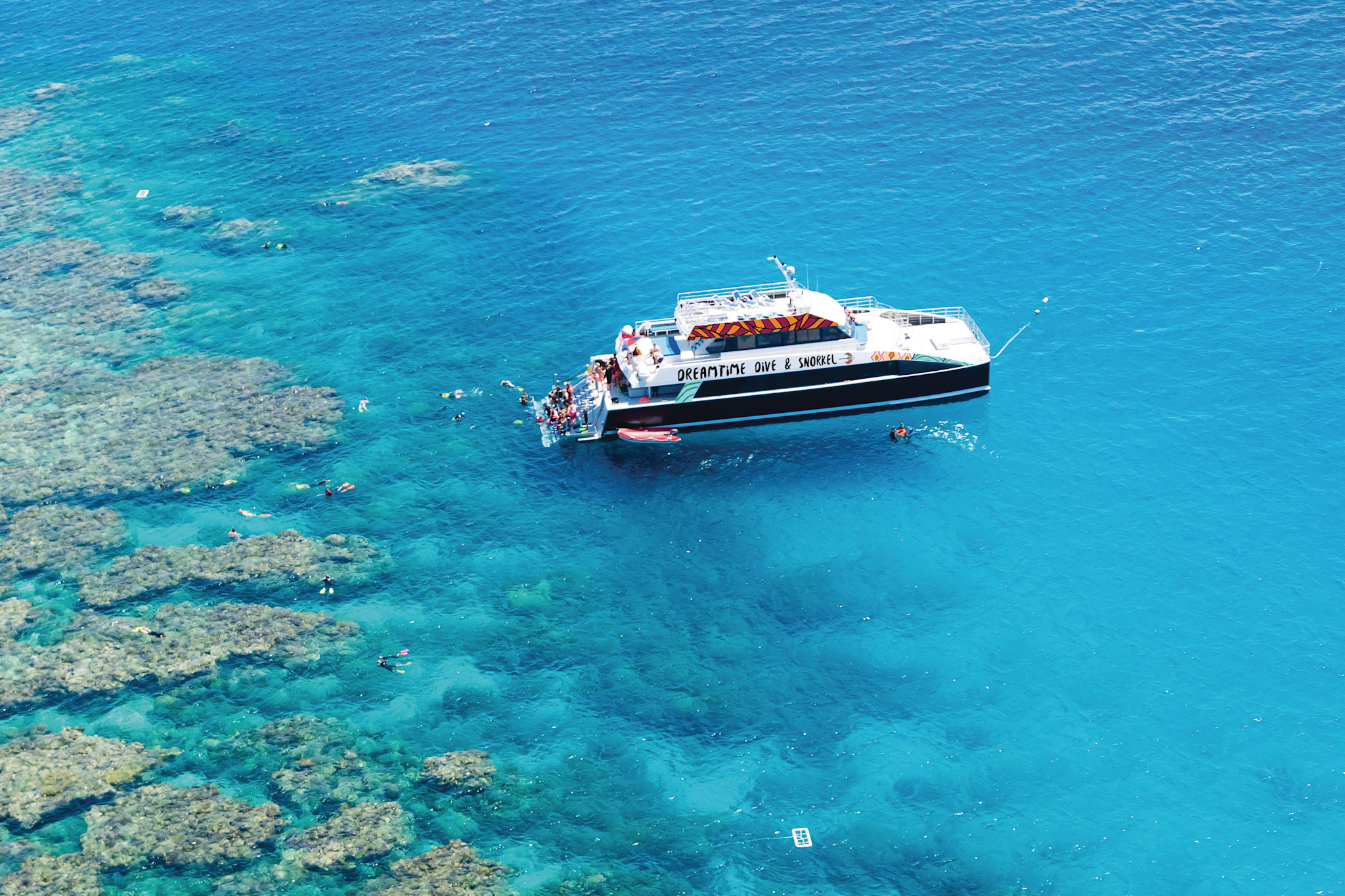 Join Indigenous guides to learn about the significance of the Great Barrier Reef with Dreamtime Dive and Snorkel, Queensland © Tourism Australia
