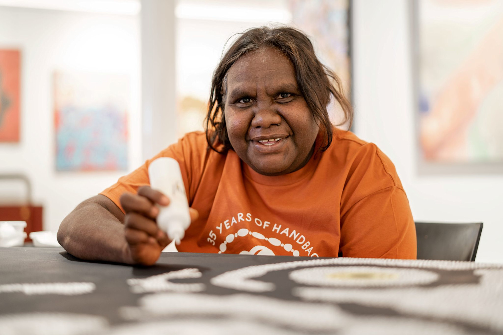 A visit to GoCA provides a unique opportunity to view authentic Indigenous artwork, learn about its significance, and observe artists at work. © Tourism Australia