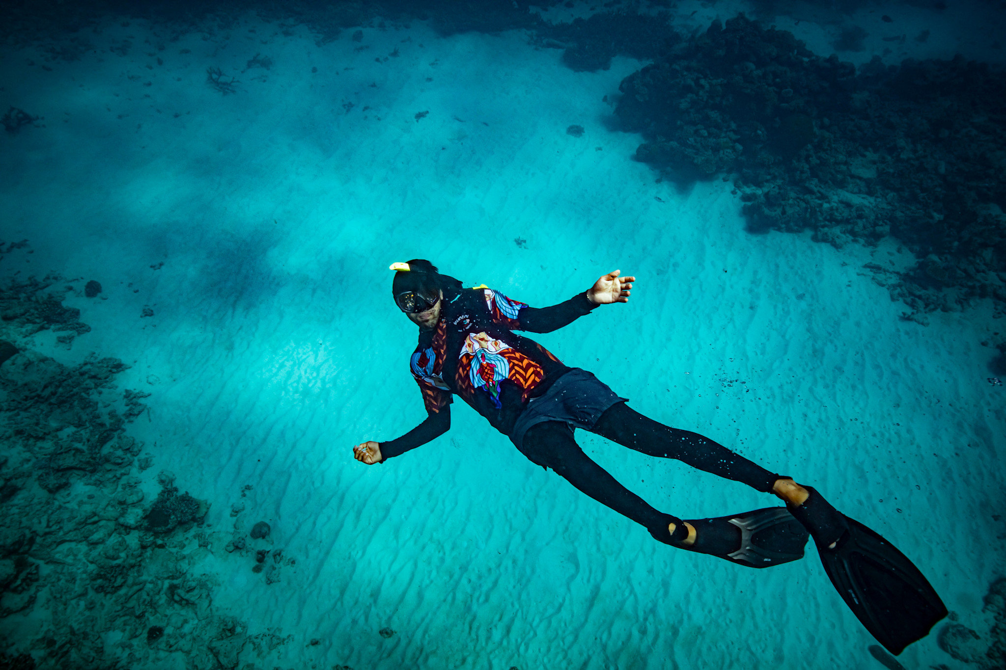 Floating around the Great Barrier Reef with Indigenous guides from Dreamtime Dive and Snorkel, Queensland © Tourism Australia
