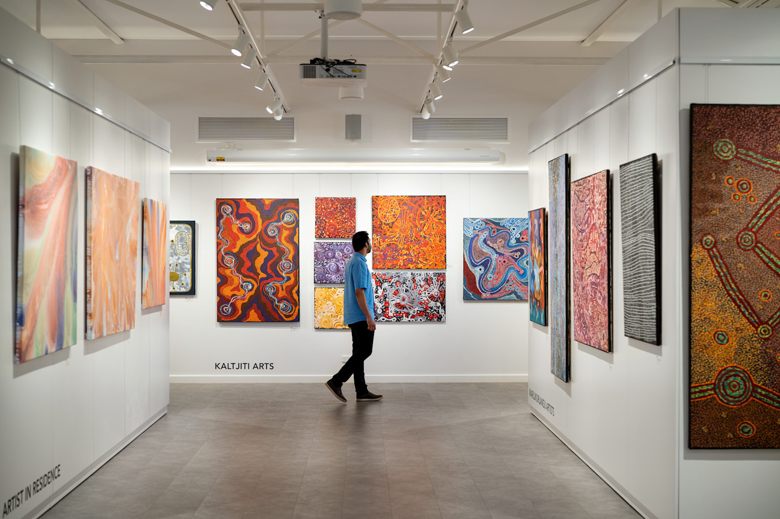 Exploring Aboriginal art within the Gallery of Central Australia, part of Voyages Indigenous Tourism Australia in the Northern Territory © Tourism Australia