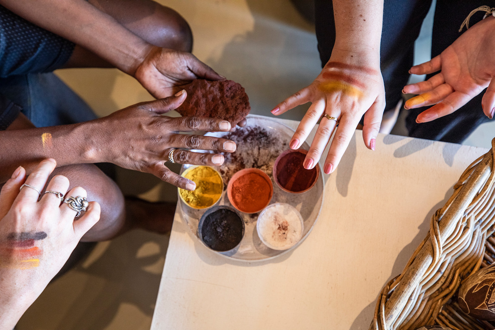 Sharing artistic knowledge at Waringarri Aboriginal Arts in Kununurra, Western Australia © Tourism Australia
 
