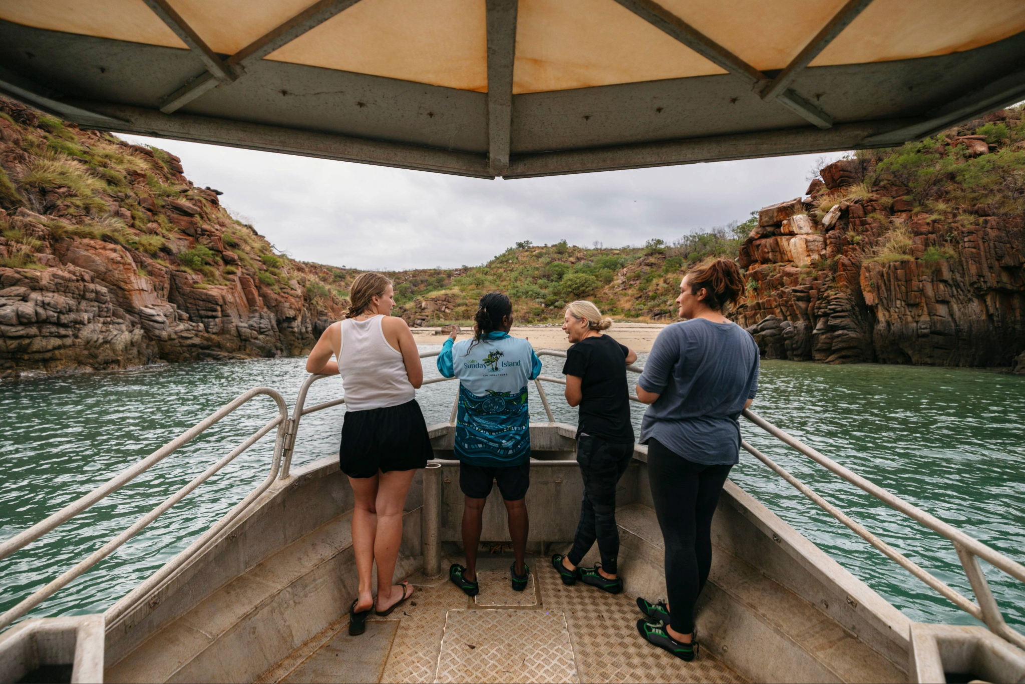 Guide Rosanna Angus of Oolin Sunday Island Cultural Tours, Western Australia, cruising to Sunday Island with guests © Tourism Australia